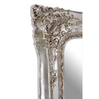 Tall, highly decorative champagne mirror. A statement mirror with its luxurious design and ornate detailing.