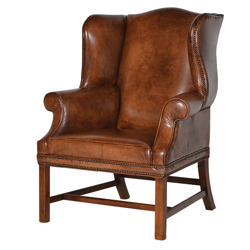 The absolutely classic tobacco leather wing chair, exceptional size and quality. The most luxurious comfort.  H: 104 cm  W: 79 cm D: 85 cm