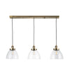 3 light, linear pendant in clear glass with antique brass metal accents and ceiling plate. To add light over your kitchen island or dining area.