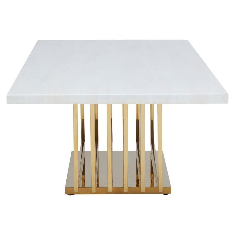 Absolutely beautiful white faux marble topped coffee table on an intricately designed base.  The base is in a shiny, gilt coloured metal.