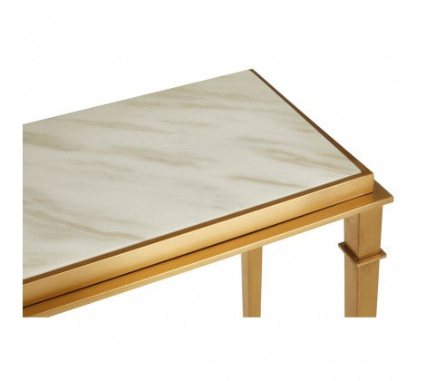 Luxurious white marble topped console on brushed gilt metal legs. A rare, perfect piece of furniture