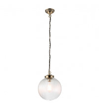 Ribbed glass globe pendant with antique brass fittings. Unusual ribbed circular globe light, disperses light softly in your space, ideal hall light or in a kitchen, over an island, a versatile light to suit any decor. 
