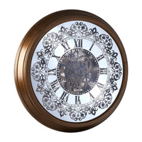 Moving cog clock black grey etched with roman numerals on a reflective mirrored face.  Moving cogs add interest to this stunning clock with a striking gold bronze metal surround.