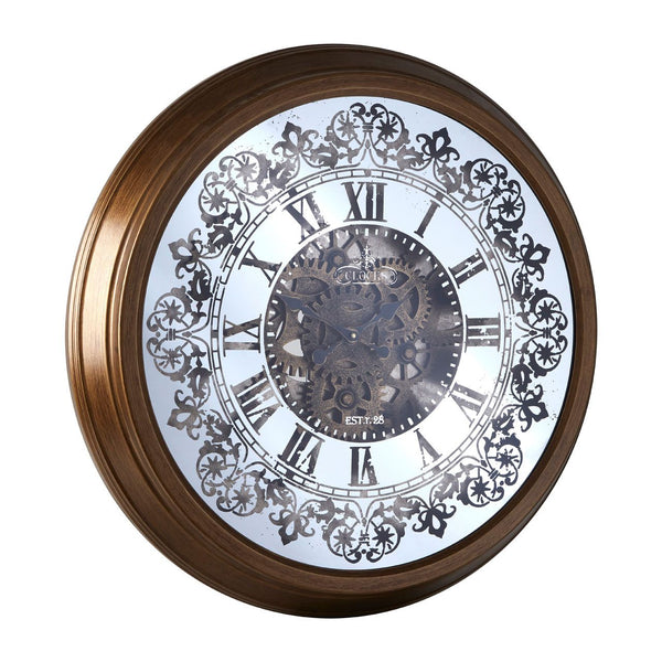 Moving cog clock black grey etched with roman numerals on a reflective mirrored face.  Moving cogs add interest to this stunning clock with a striking gold bronze metal surround.