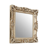 Compact but impactful soft silver heavily baroque framed mirror.  Huge impact from a smaller mirror.