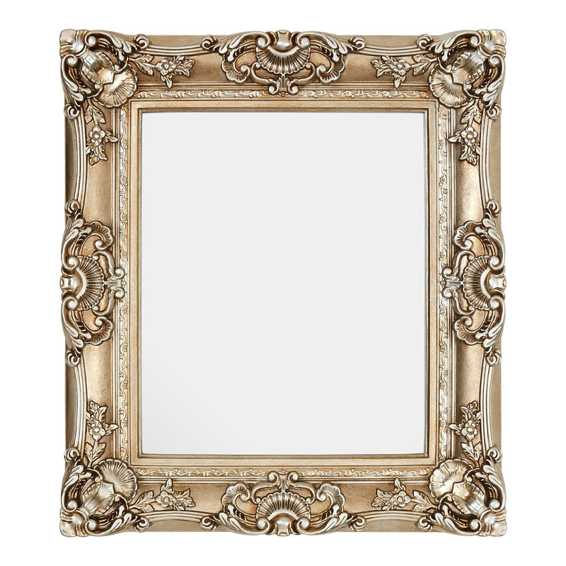 Compact but impactful soft silver heavily baroque framed mirror.  Huge impact from a smaller mirror.