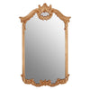 Gold ornate mirror with classic shape and baroque frame.