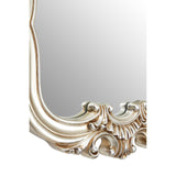 Smaller baroque shield  shaped mirror with crest in silver.