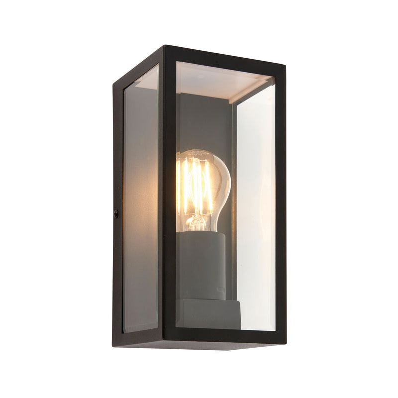 Black metal and glass caged wall light with a filament bulb option to add to an industrial element. IP44