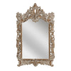 Exceptionally large and decorative scroll mirror in a limewashed ornate frame.