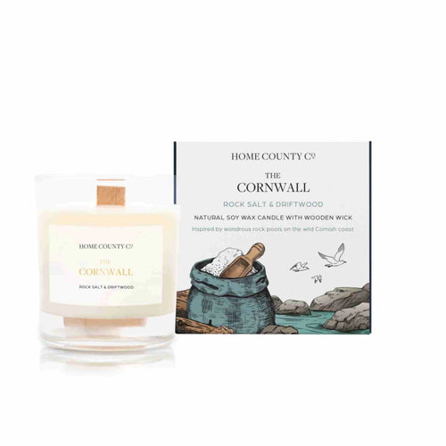 A beautifully packaged scented candle that diffuses scents of rock salt and driftwood.  This coastal candle evokes romantic scenes from Cornwall with it's coastal scents of seaweed, amber, musk and patchouli oil.  A lovely gift to give friends and relatives this is a quality soy candle poured in the UK, which is vegan friendly with a re-usable glass jar.  Box measures H: 9.5cm  W: 8.5cm  Candle glass jar measures H: 9cm W: 8cm