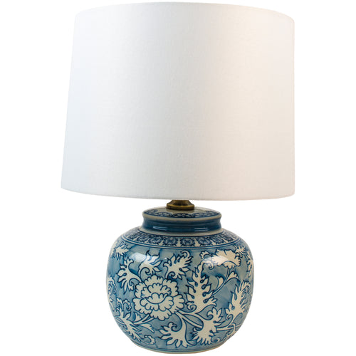 A really pretty smaller blue and white round based ceramic lamp with white shade.