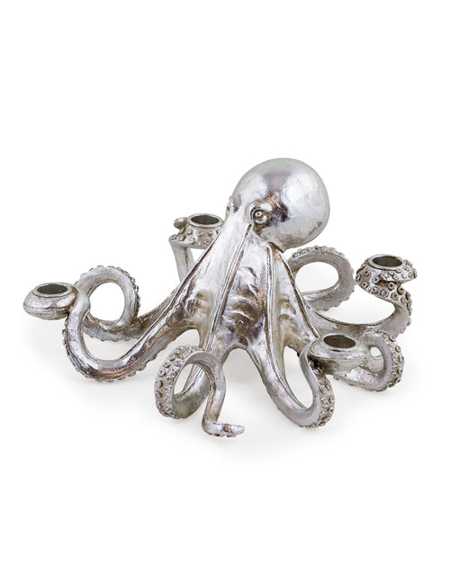 A delightful table centerpiece, this silver gilt octopus candle holder holds eight tall candles.  Always glamorous, this is uniquely something different for home.  H: 14 cm W: 28 cm D: 28 cm.