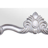Stunningly decorative, silver ornate overmantle with curved ornate frame.
