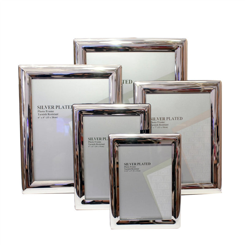 Add a touch of sophistication to your memories with our Silver Plated Photo Frames. Expertly crafted and tarnish-resistant, these frames offer a mirror-like finish that complements both modern and classic interiors. Available in multiple sizes — 3.5" x 5", 4" x 6", 5" x 7", 6" x 8", and 8" x 10" — each frame provides a sleek, polished border that enhances your photographs without overpowering them.
