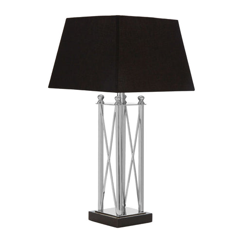 A Stylist Stainless Steel Table Lamp With a Black Granite Base complemented with a black shade.