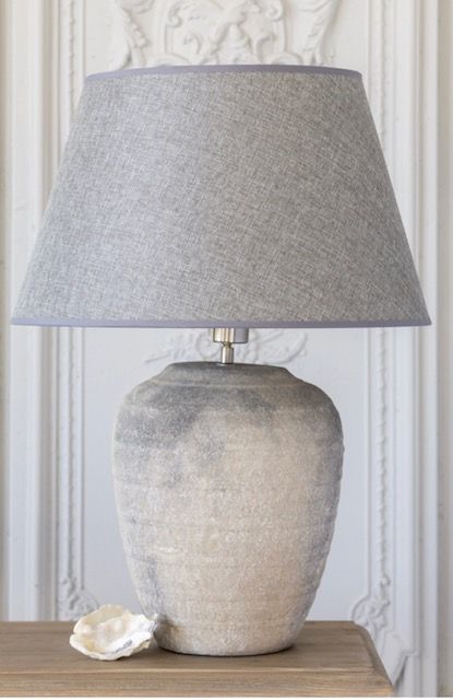 Perfect for a muted interior, these stoneware lamps and matching shades are perfect to add tone and texture and not to mention a great glow of light to your room. 
