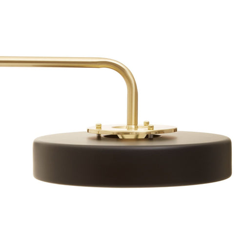 Stunning brushed gold floor lamp with disc shaped top.