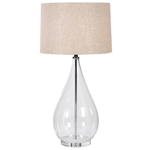 Exceptionally tall simple glass table lamp with a neutral linen style shade, the height of this lamp makes a real statement and will add a lot of light to any area.  H:  90 cm W:  45 cm.