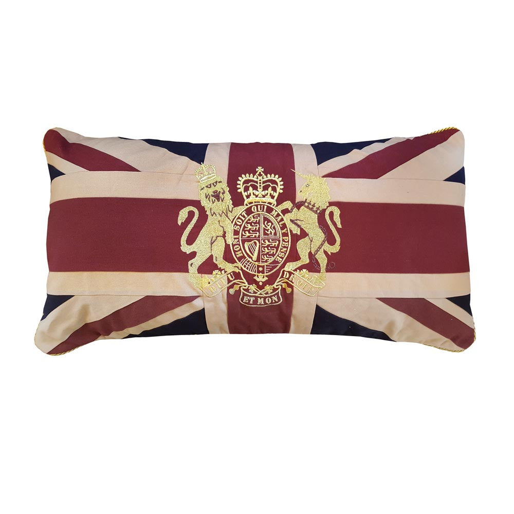 Long union jack crested cushion on a white background.