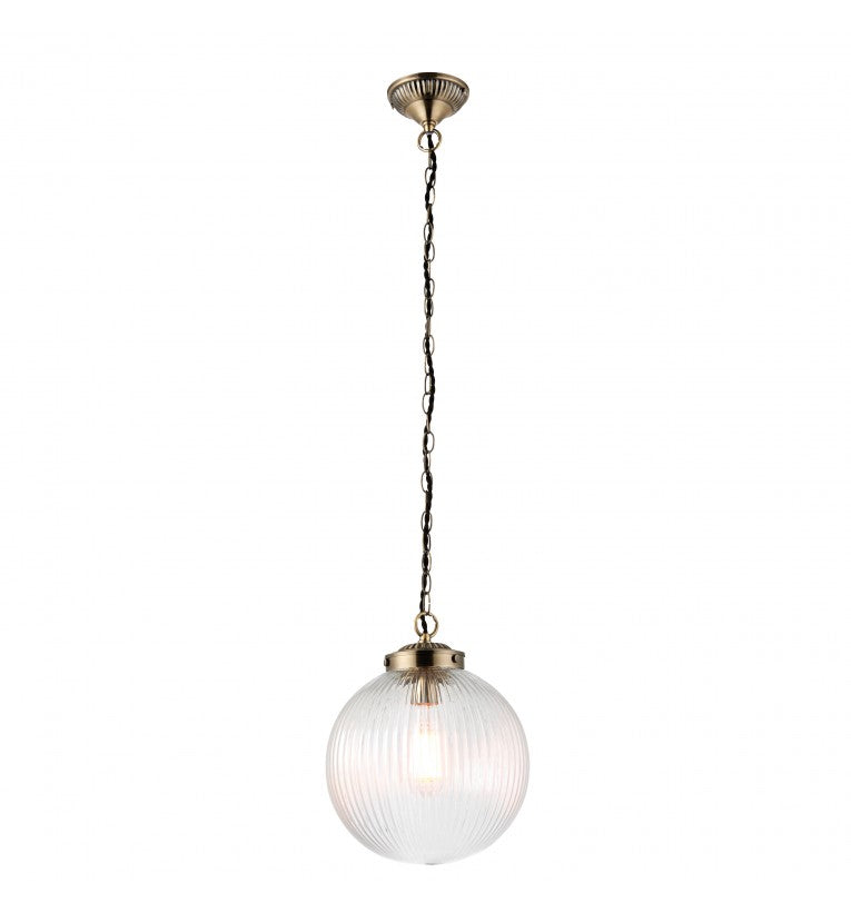 Ribbed glass globe pendant with antique brass fittings. Unusual ribbed circular globe light, disperses light softly in your space, ideal hall light or in a kitchen, over an island, a versatile light to suit any decor. 
