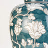 Tall green and white floral swirl ceramic base table lamp with white shade. Stunning floral green and white lamp with large ivory coloured white shade. Ceramic lamps are a staple of English country house decor but usually in a blue and white colour, this is different take on the theme in a striking deep green and white. You can find a wide range of these classic ceramic lamps and shades on our website, in many colours and sizes.&nbsp;