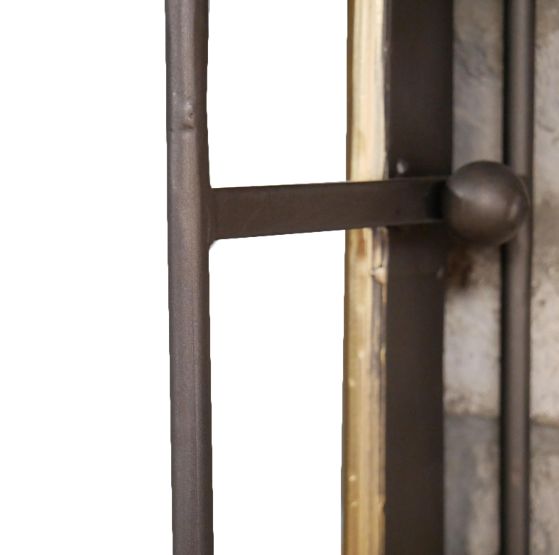 Metal swivel mirror set in dark metal casing with drawer, accented in brushed brass colour. Useful wall mounted mirror with the addition of a small drawer, perfect for your hall or bedroom.&nbsp;