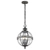 Outdoor black globe pendant light with clear seeded glass and classic lantern-style metal frame, IP44 rated for elegant exterior lighting.