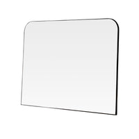 Wide overmantle wall mirror with a slim black frame, rectangular shape and softly rounded upper corners