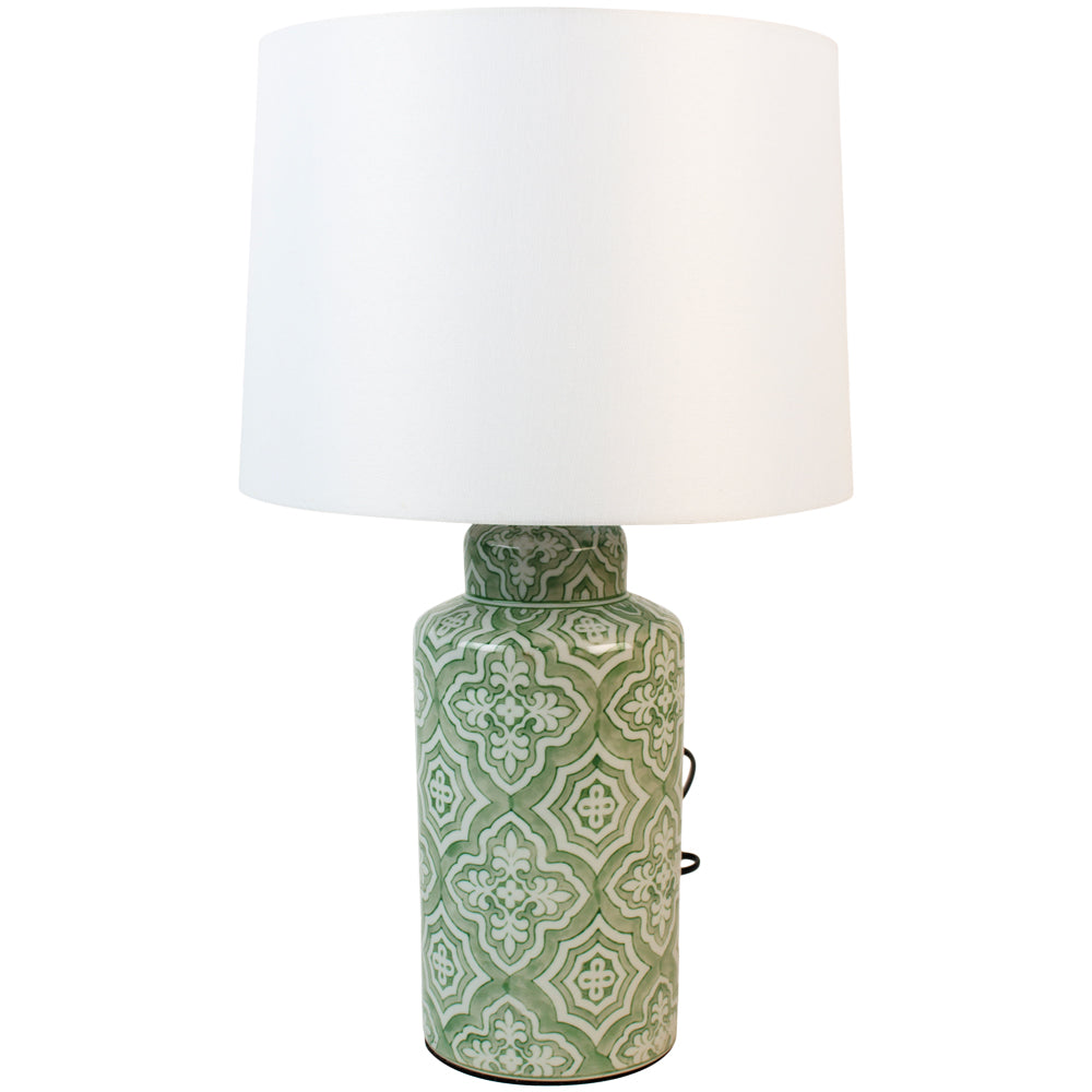 A beautiful pale green ceramic lamp base with a large white linen shade, a bright, clean lamp to add a striking glow to any room.&nbsp; Ceramic lamps have been an important part of Engliah country homes for years and you can now place them in your town home. This particular light is decorated in a beautiful pale green with an oriental pattern.&nbsp; The addition of the substantial white fabric shade, you'll get a great light from this lamp.