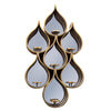 Tall teardrop-shaped mirror with pierced Moroccan-style metal frame and candleholders