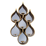 Exceptionally pretty ,teardrop sectioned mirror with candle sconces, tall enough to make a real statement.  The pierced metal adding a Moroccan feel to this piece,  H: 88 cm W: 47 cm D: 12 cm.