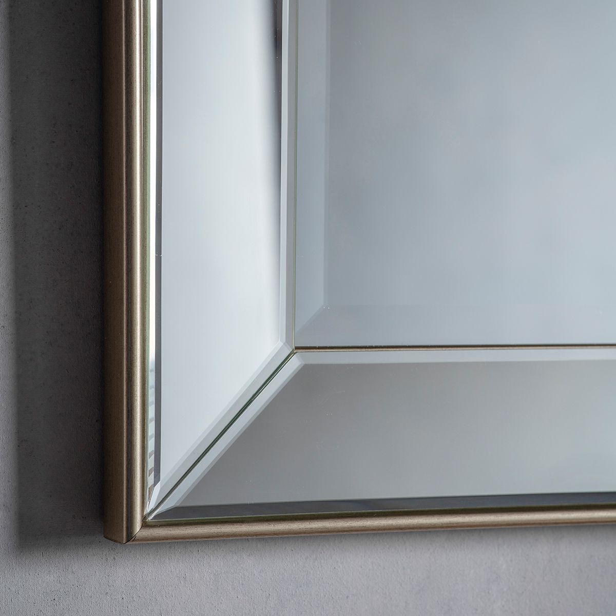 Bevelled glass edge on Venetian mirror